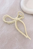 Metal Bow Ivory Claw Clip